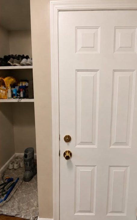 Repaired and repainted door jamb with the door rehung