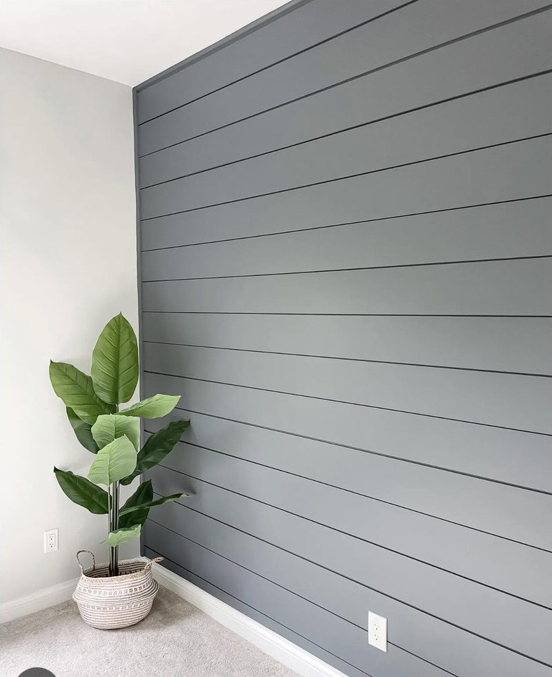 Grey shiplap accent wall installed level and tight